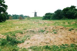 Windmill, dyke and shell crater on the area of Hatfield that represented Holland.