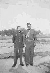Sidney E. Risher (left) in France during 1945